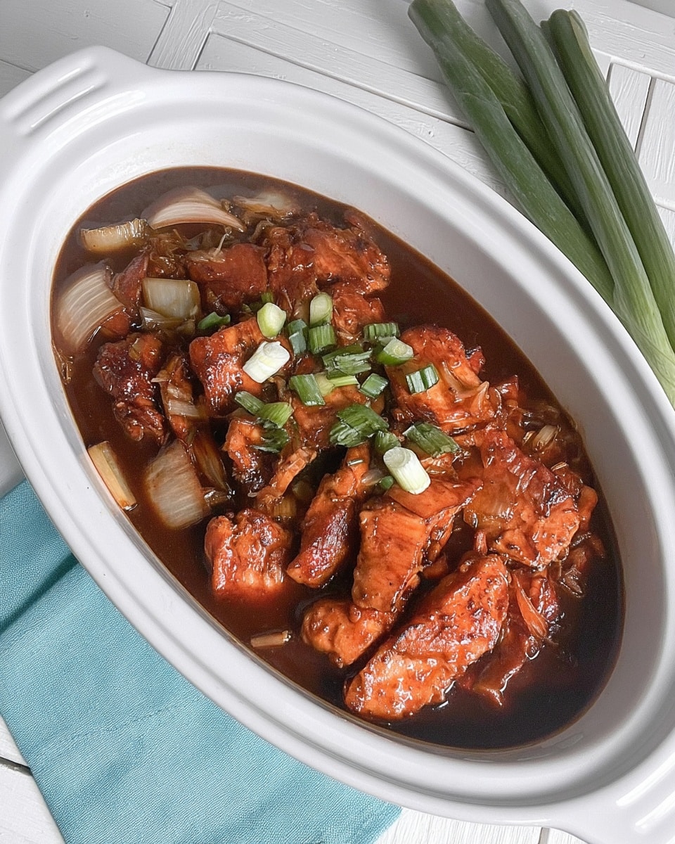 Crock Pot Bourbon Chicken 10 Crockpot bourbon chicken on a party platter with sesame garnish