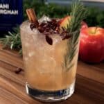 Fall Margarita 7 Fall margarita in a glass with cinnamon sugar rim and rosemary garnish