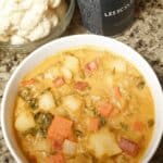 Creamy Vegetable Soup 7 Creamy fall soup recipes in white bowl with steam rising