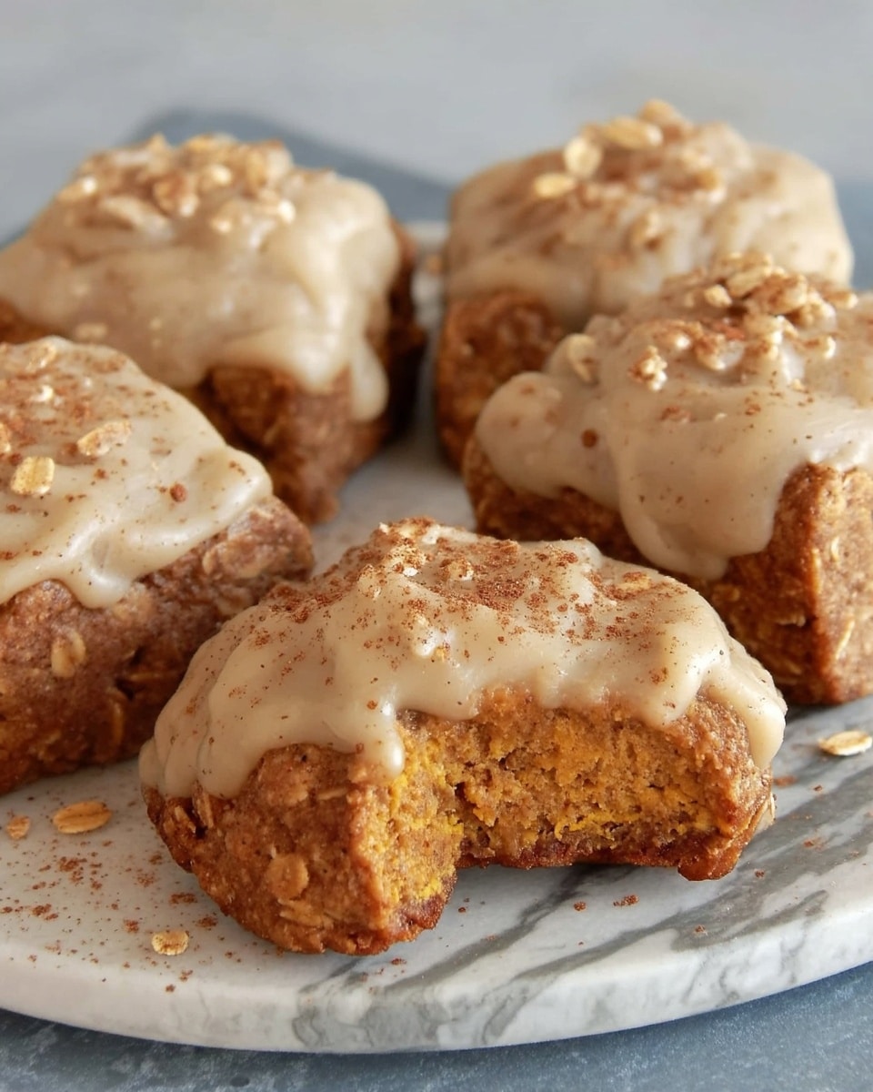 Pumpkin Oatmeal Cookies 8 Pumpkin oatmeal cookies on rustic fall table with mini pumpkins