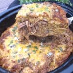 Slow Cooker Chicken Enchilada Casserole 7 Slow cooker enchilada casserole in fall-themed crockpot