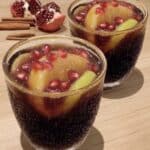 Spiced Autumn Apple Sangria 7 Fall sangria recipes with apples and oranges in glass pitcher