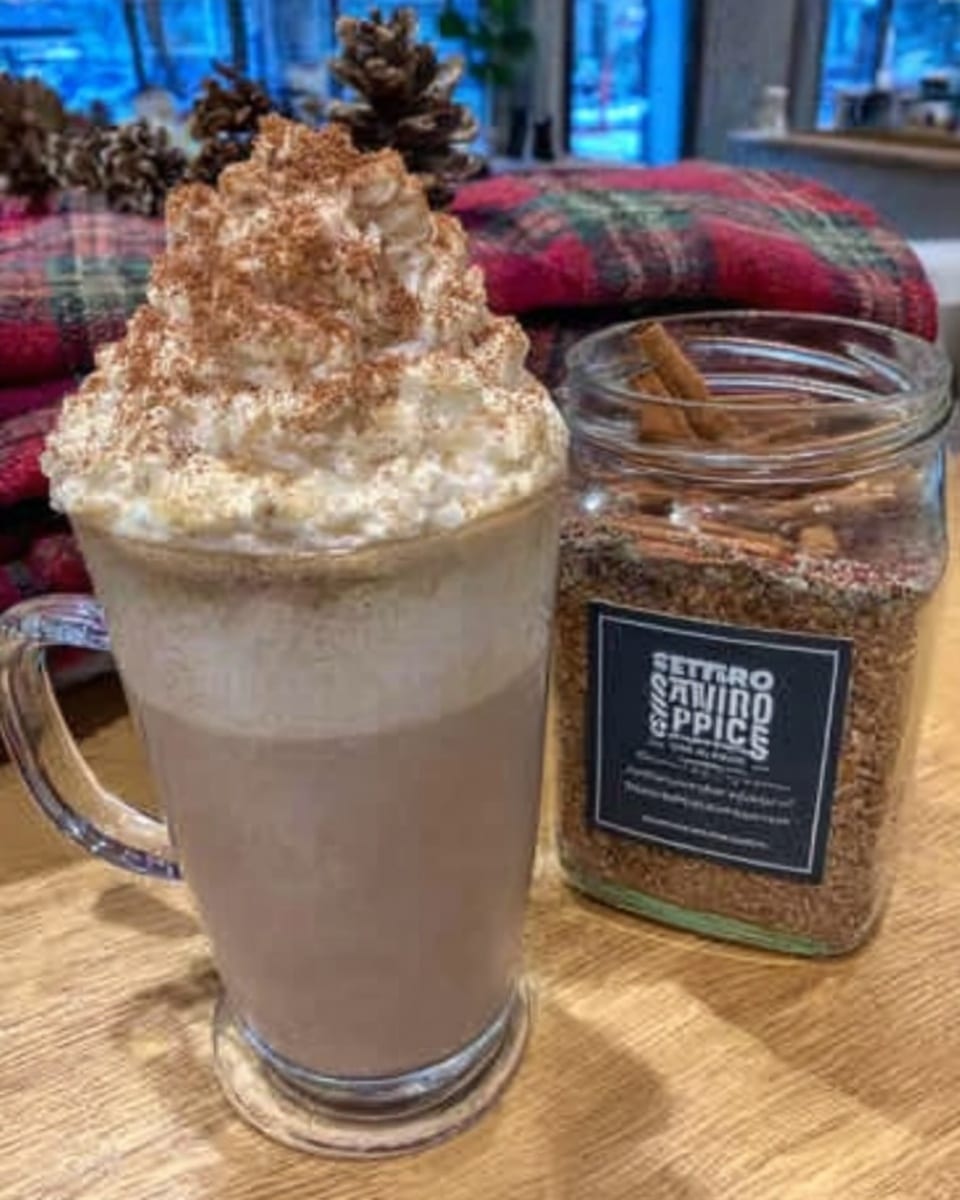 Pumpkin Spice Latte 9 Iced pumpkin spice latte with fall leaves and straw