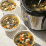 Low Carb Chicken Soup 7 A steaming bowl of Low Carb Chicken Soup with fresh herbs.