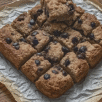 Close-up of a stack of Almond Butter Chocolate Chip Oatmeal Bars.