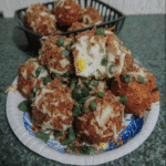 Close up of the finished Dill Pickle Bacon Cheese Ball showing the texture.