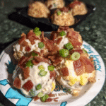 Dill Pickle Bacon Cheese Ball 7 Dill Pickle Bacon Cheese Ball served with crackers.