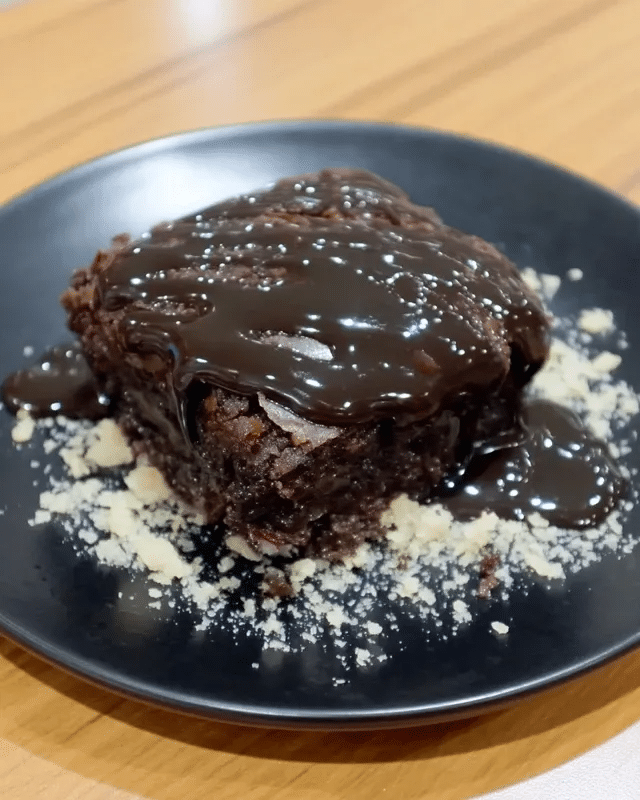 No-Bake Caramel Brownies 10 No-bake caramel brownies served on a plate with a scoop of ice cream.