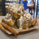 Gluten Free Pumpkin Spice Scones beautifully arranged on a plate, ready to be served with coffee.