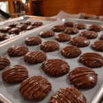 A plate of homemade vegan Thin Mints, ready to be enjoyed.