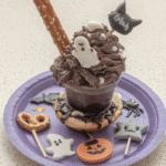 Close-up of several completed Witch Brooms arranged on a platter, ready to be served.